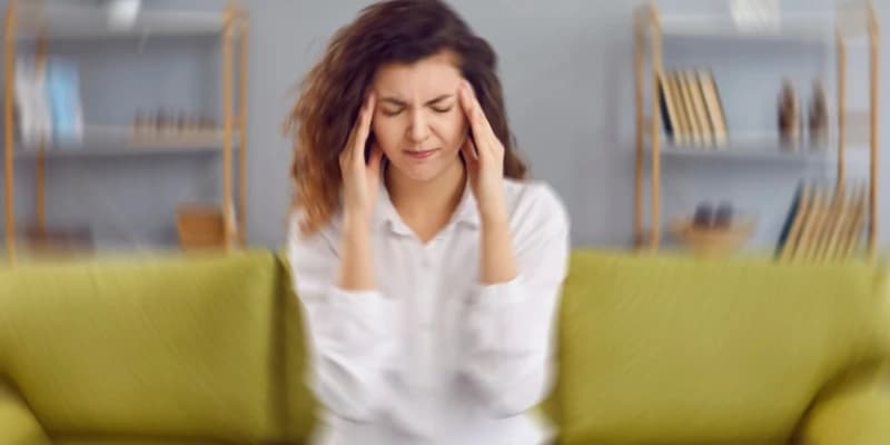 woman who is experiencing dizziness