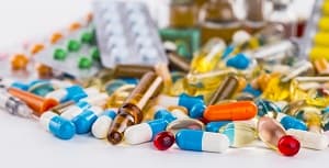 Various pills and medications on a table