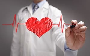 Image of doctor drawing heart.